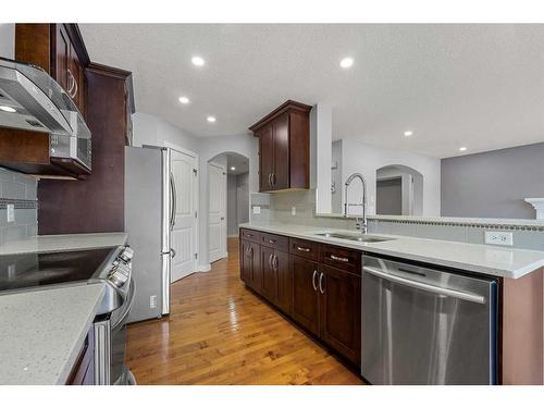 228 Taralake Terrace Ne, Calgary, AB - Indoor Photo Showing Kitchen With Double Sink