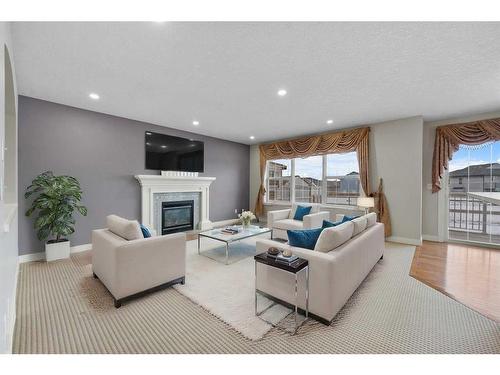 228 Taralake Terrace Ne, Calgary, AB - Indoor Photo Showing Living Room With Fireplace