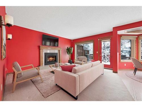 8504 Hawkford Gate Nw, Calgary, AB - Indoor Photo Showing Living Room With Fireplace