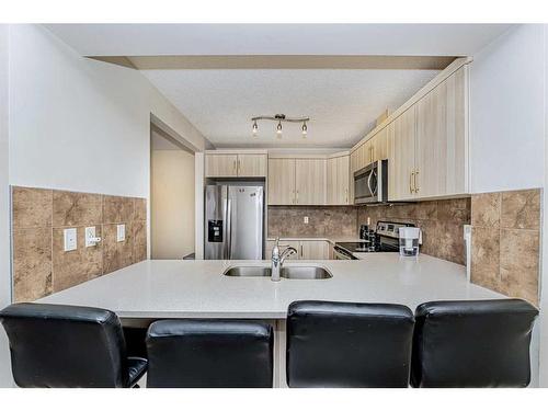 134 Cityscape Boulevard Ne, Calgary, AB - Indoor Photo Showing Kitchen With Double Sink With Upgraded Kitchen