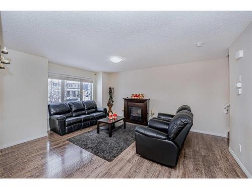 134 Cityscape Boulevard Ne, Calgary, AB - Indoor Photo Showing Living Room With Fireplace