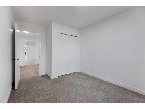 80 Sceptre Close Nw, Calgary, AB - Indoor Photo Showing Other Room