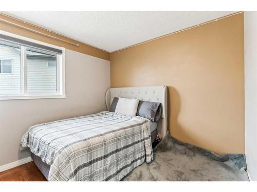 357 Martinwood Place Ne, Calgary, AB - Indoor Photo Showing Bedroom