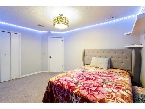 357 Martinwood Place Ne, Calgary, AB - Indoor Photo Showing Bedroom