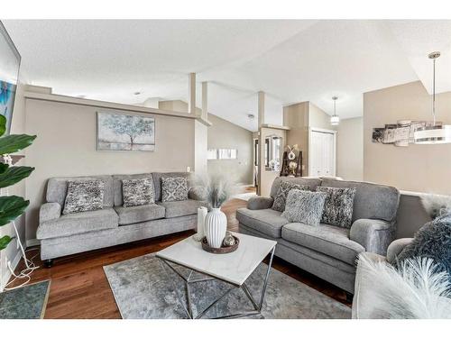 357 Martinwood Place Ne, Calgary, AB - Indoor Photo Showing Living Room