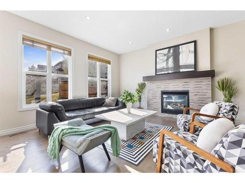 283 Nolan Hill Boulevard Nw, Calgary, AB - Indoor Photo Showing Living Room With Fireplace