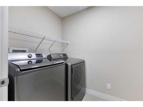 283 Nolan Hill Boulevard Nw, Calgary, AB - Indoor Photo Showing Laundry Room