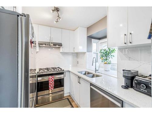 72 Deerpath Road Se, Calgary, AB - Indoor Photo Showing Kitchen With Double Sink With Upgraded Kitchen