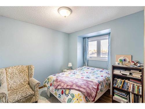 72 Deerpath Road Se, Calgary, AB - Indoor Photo Showing Bedroom