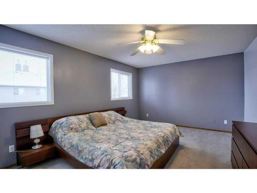 144 Mt Aberdeen Manor Se, Calgary, AB - Indoor Photo Showing Bedroom