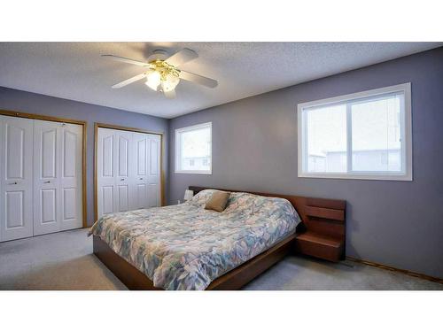 144 Mt Aberdeen Manor Se, Calgary, AB - Indoor Photo Showing Bedroom