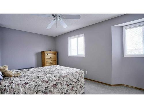 144 Mt Aberdeen Manor Se, Calgary, AB - Indoor Photo Showing Bedroom