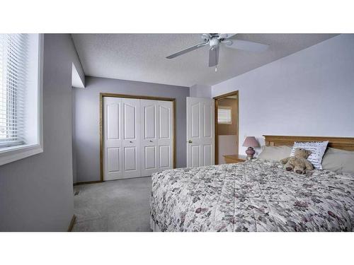 144 Mt Aberdeen Manor Se, Calgary, AB - Indoor Photo Showing Bedroom