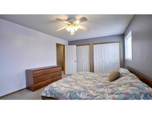 144 Mt Aberdeen Manor Se, Calgary, AB - Indoor Photo Showing Bedroom