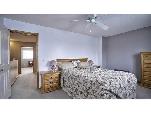 144 Mt Aberdeen Manor Se, Calgary, AB - Indoor Photo Showing Bedroom