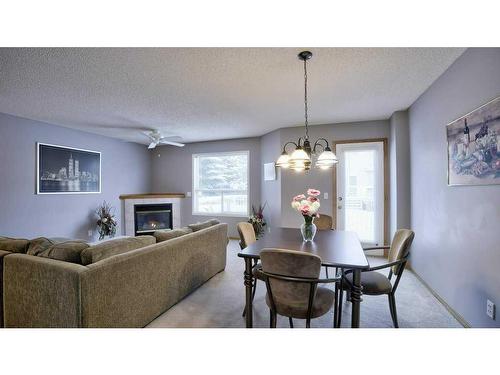 144 Mt Aberdeen Manor Se, Calgary, AB - Indoor With Fireplace