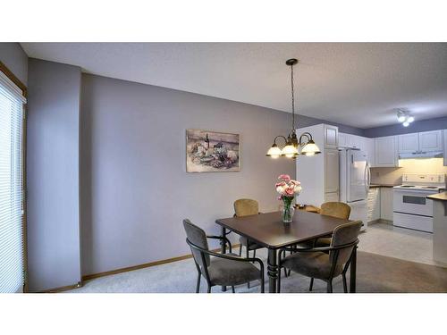 144 Mt Aberdeen Manor Se, Calgary, AB - Indoor Photo Showing Dining Room