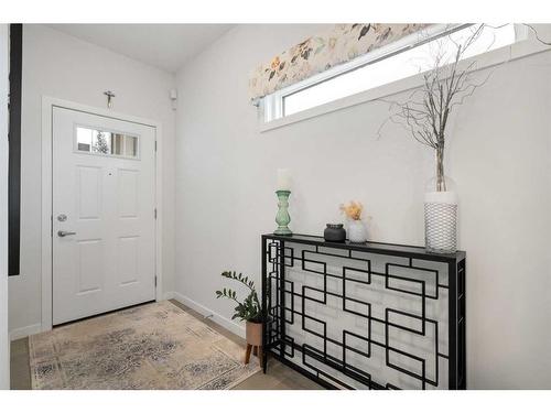 94 Walgrove Green Se, Calgary, AB - Indoor Photo Showing Living Room With Fireplace