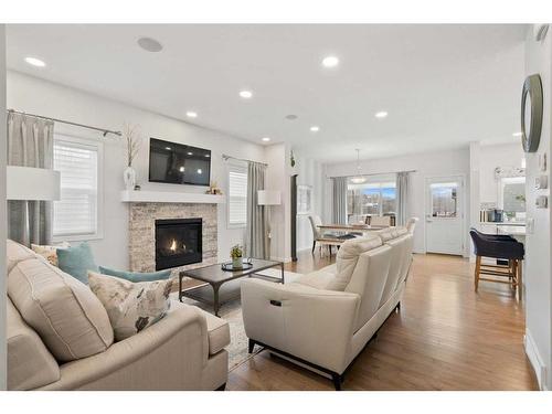 94 Walgrove Green Se, Calgary, AB - Indoor Photo Showing Living Room With Fireplace