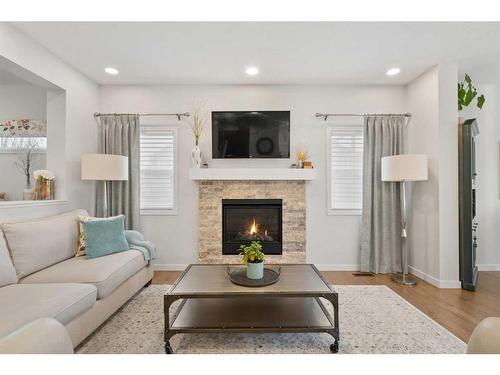 94 Walgrove Green Se, Calgary, AB - Indoor Photo Showing Living Room With Fireplace