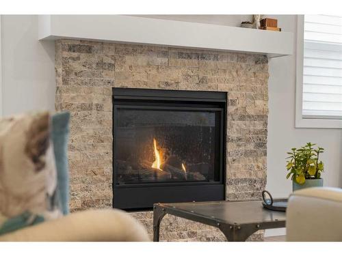 94 Walgrove Green Se, Calgary, AB - Indoor Photo Showing Living Room With Fireplace