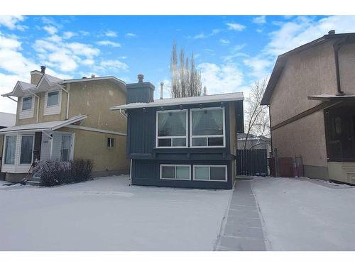 153 Templemont Drive Ne, Calgary, AB - Outdoor With Facade