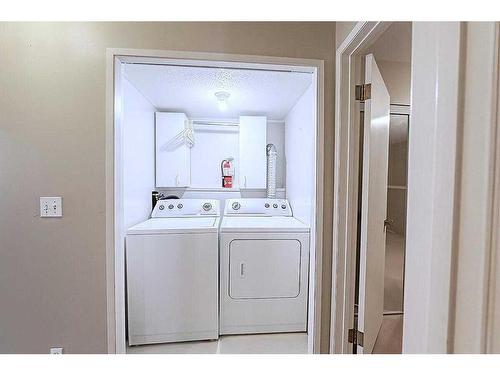 153 Templemont Drive Ne, Calgary, AB - Indoor Photo Showing Laundry Room