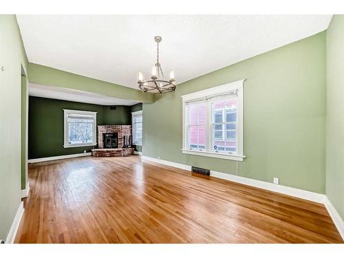 234 10A Street Nw, Calgary, AB - Indoor With Fireplace