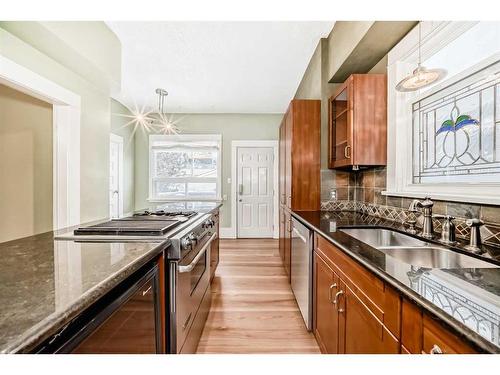 234 10A Street Nw, Calgary, AB - Indoor Photo Showing Kitchen With Double Sink