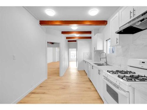 1710 6 Avenue Nw, Calgary, AB - Indoor Photo Showing Kitchen With Double Sink With Upgraded Kitchen