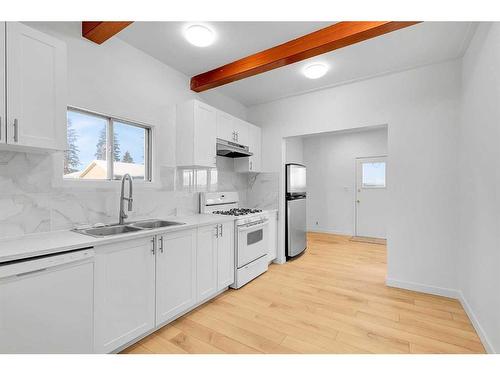 1710 6 Avenue Nw, Calgary, AB - Indoor Photo Showing Kitchen With Double Sink