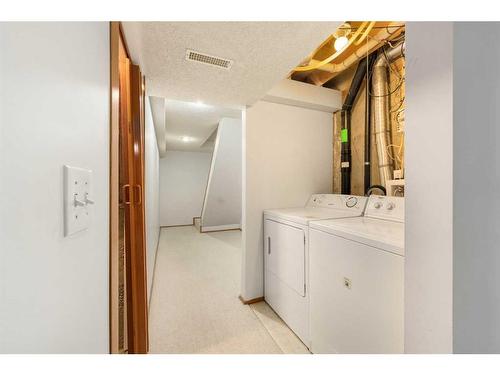 105 Somervale Park Sw, Calgary, AB - Indoor Photo Showing Laundry Room