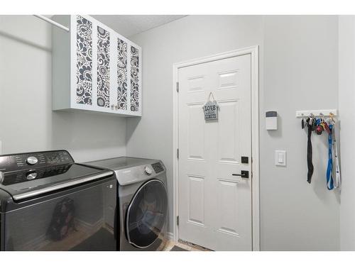 64 Brightonstone Gardens Se, Calgary, AB - Indoor Photo Showing Laundry Room