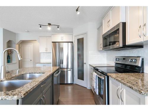 64 Brightonstone Gardens Se, Calgary, AB - Indoor Photo Showing Kitchen With Double Sink With Upgraded Kitchen