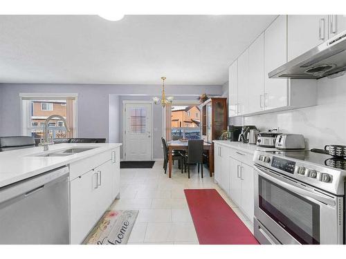 216 Tarawood Place Ne, Calgary, AB - Indoor Photo Showing Kitchen With Stainless Steel Kitchen With Double Sink