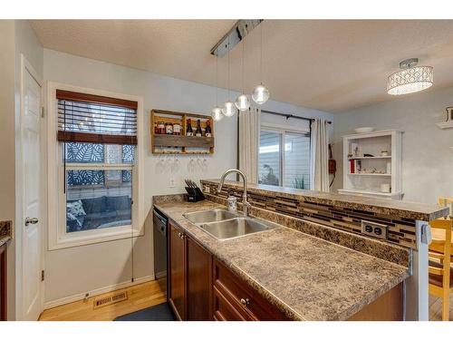 129 Elgin Place Se, Calgary, AB - Indoor Photo Showing Kitchen With Double Sink