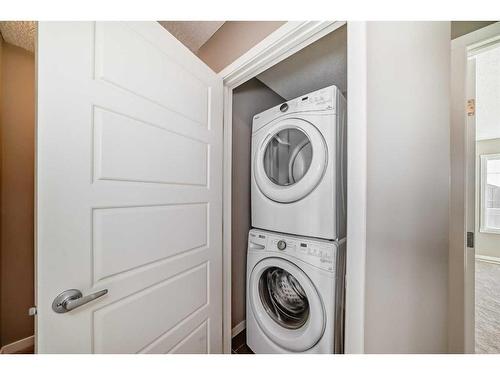 57 Nolanlake Cove Nw, Calgary, AB - Indoor Photo Showing Laundry Room