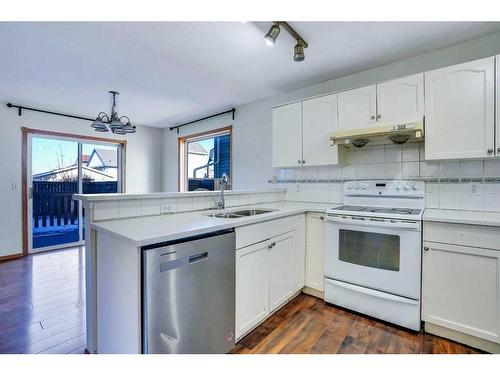 801 Martindale Boulevard Ne, Calgary, AB - Indoor Photo Showing Kitchen With Double Sink