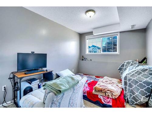 54 Taracove Road Ne, Calgary, AB - Indoor Photo Showing Bedroom