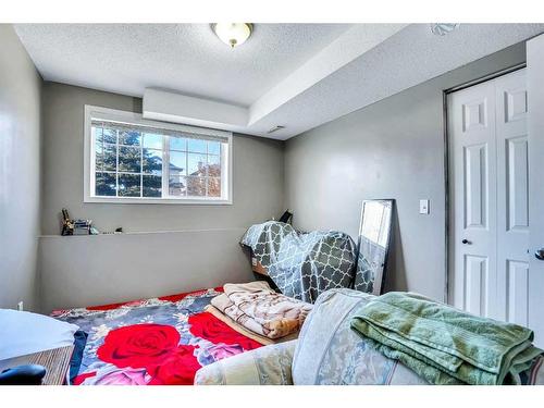 54 Taracove Road Ne, Calgary, AB - Indoor Photo Showing Bedroom