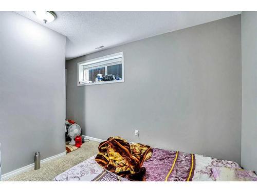 54 Taracove Road Ne, Calgary, AB - Indoor Photo Showing Bedroom