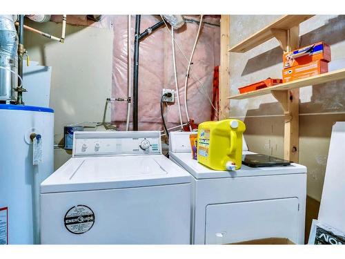 54 Taracove Road Ne, Calgary, AB - Indoor Photo Showing Laundry Room