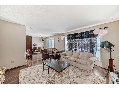 4023 44 Avenue Ne, Calgary, AB - Indoor Photo Showing Living Room With Fireplace