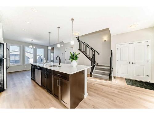 142 Marquis Heights Se, Calgary, AB - Indoor Photo Showing Kitchen With Double Sink With Upgraded Kitchen