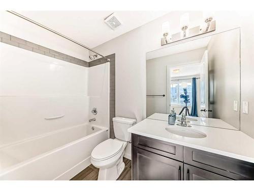 142 Marquis Heights Se, Calgary, AB - Indoor Photo Showing Bathroom