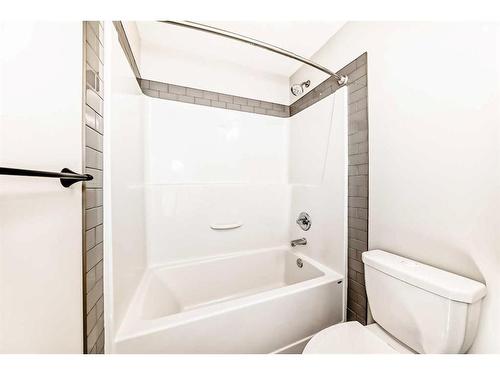 142 Marquis Heights Se, Calgary, AB - Indoor Photo Showing Bathroom