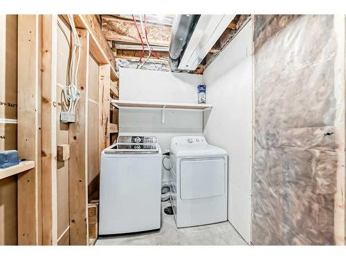 142 Marquis Heights Se, Calgary, AB - Indoor Photo Showing Laundry Room