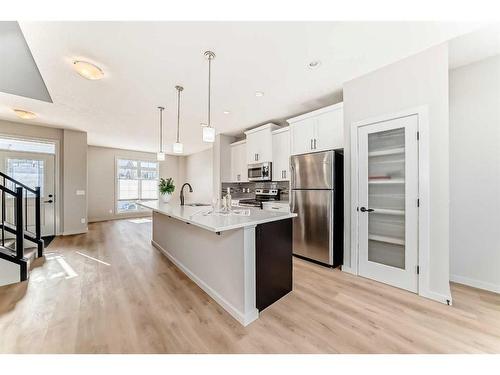 142 Marquis Heights Se, Calgary, AB - Indoor Photo Showing Kitchen With Stainless Steel Kitchen With Upgraded Kitchen