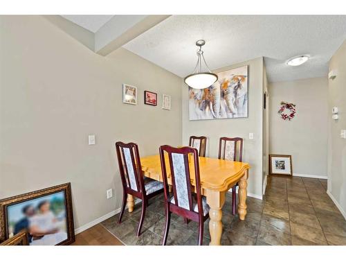 82 Panatella Villas Nw, Calgary, AB - Indoor Photo Showing Dining Room