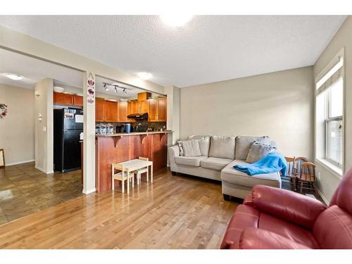 82 Panatella Villas Nw, Calgary, AB - Indoor Photo Showing Living Room